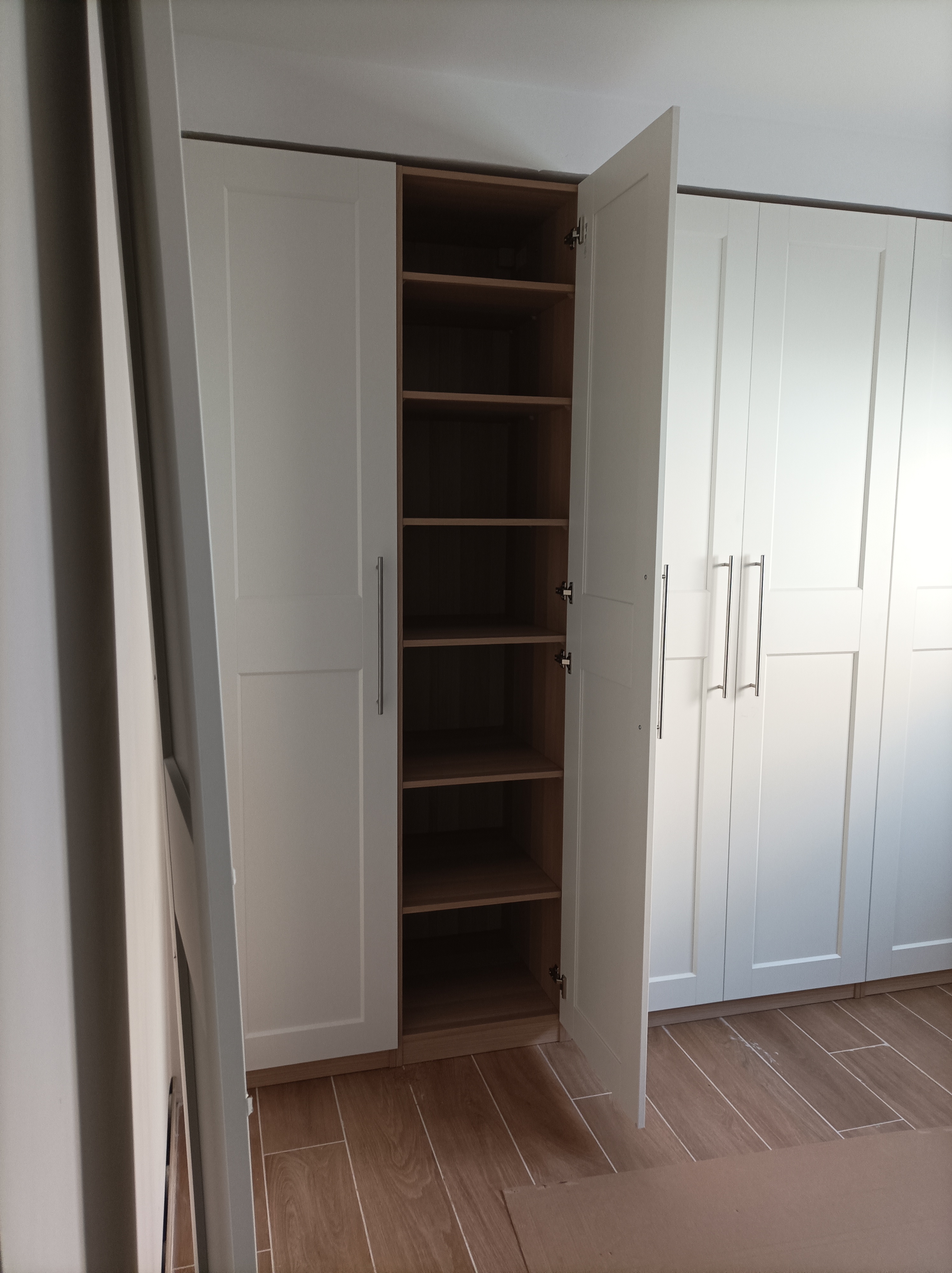 Después: Armario PAX blanco modular